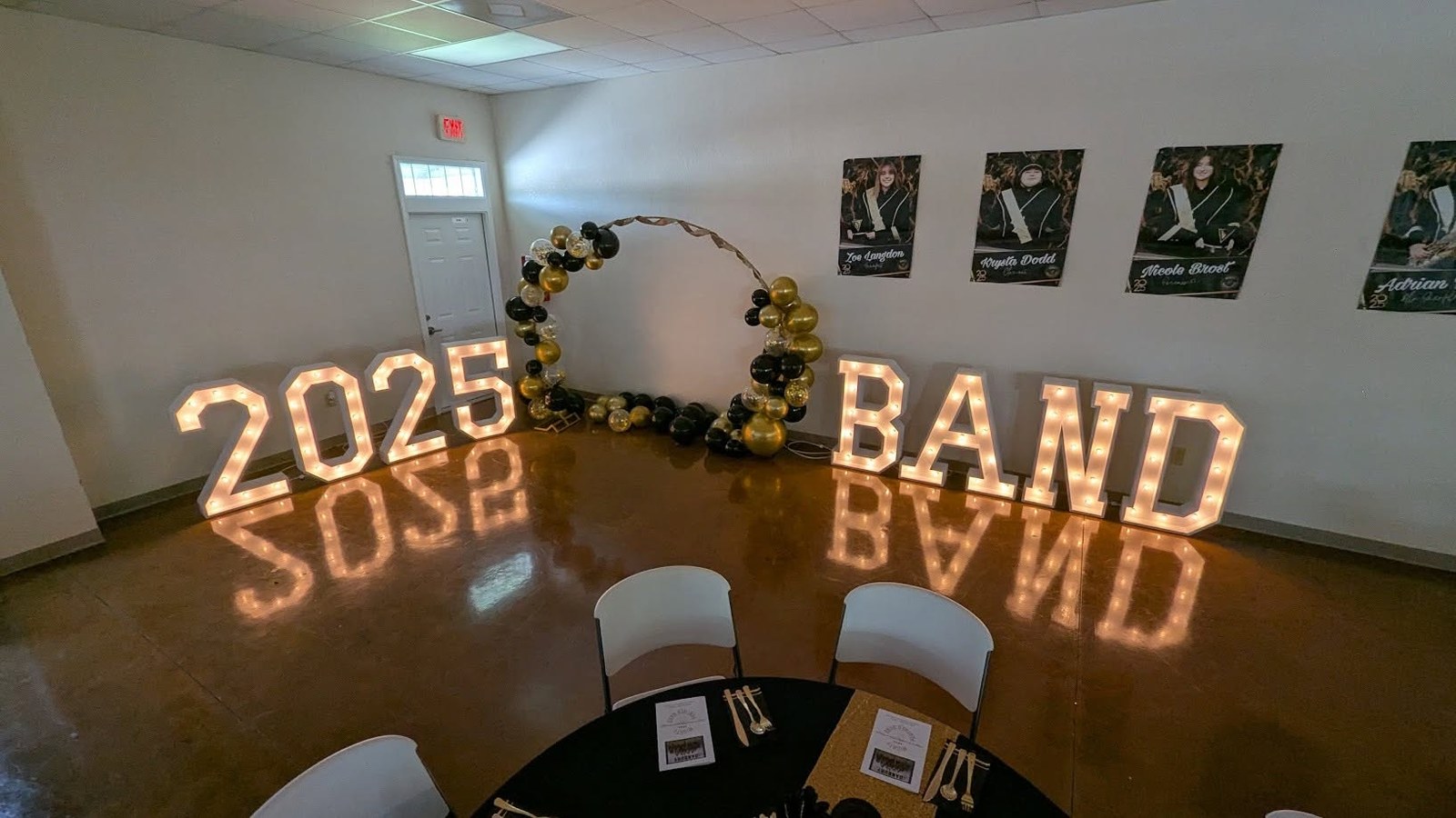 Marquee letters spelling SOSB 2025 BAND set up in a full indoor event room with balloon décor